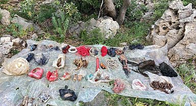 Irak'ın kuzeyinde PKK'lı teröristlere ait çok sayıda silah ve mühimmat ele geçirildi