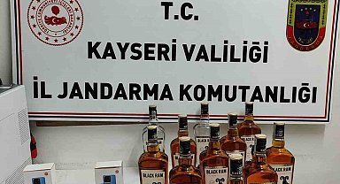 Restoranda bandrolsüz içki ve kaçak telefon ele geçirildi